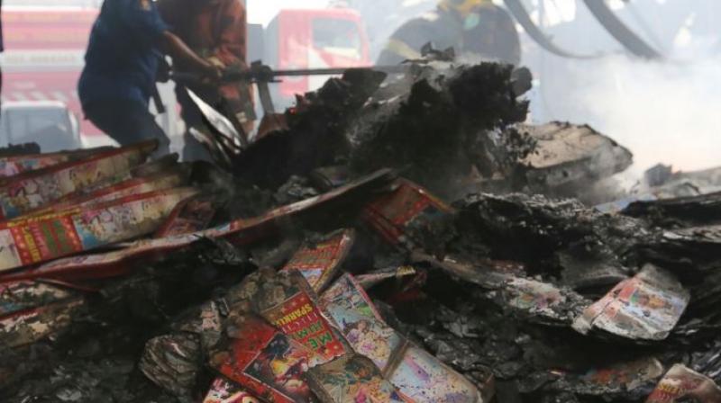 Firefighters work at the site of an explosion at a firecracker factory in Tangerang, on the outskirt of Jakarta, Indonesia, Thursday, Oct. 26, 2017. The explosion and raging fire killed a number of people and injured dozens, police said. (Photo: AP) Firefighters work at the site of an explosion at a firecracker factory in Tangerang, on the outskirt of Jakarta, Indonesia, Thursday, Oct. 26, 2017. The explosion and raging fire killed a number of people and injured dozens, police said. (Photo: AP)