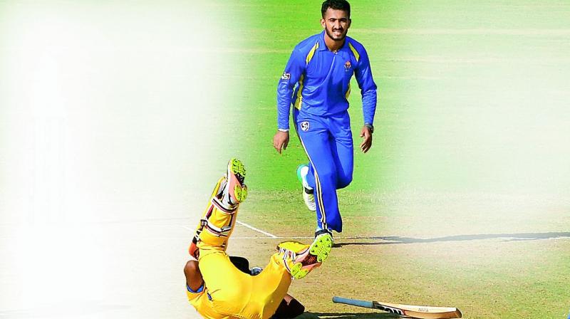 Tamil Nadu’s B. Aparajith stumbles after a head-on collision with Dinesh Karthik as Karnataka keeper C.M. Gautam takes the bail off to dismiss the batsman. — E.K. Sanjay Tamil Nadu’s B. Aparajith stumbles after a head-on collision with Dinesh Karthik as Karnataka keeper C.M. Gautam takes the bail off to dismiss the batsman. — E.K. Sanjay