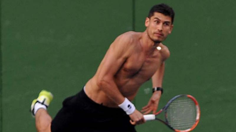 Farrukh Dustov practices his serve ahead of the Davis Cup tie against India. (Photo: DC) Farrukh Dustov practices his serve ahead of the Davis Cup tie against India. (Photo: DC)