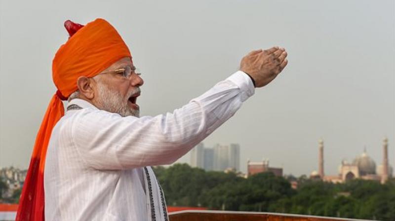 In his last Independence Day speech before Lok Sabha elections, PM Modi presented a picture of rising India under his government, contrasting it with what he termed was 'policy paralysis' under the UPA. (Photo: PTI) In his last Independence Day speech before Lok Sabha elections, PM Modi presented a picture of rising India under his government, contrasting it with what he termed was 'policy paralysis' under the UPA. (Photo: PTI)