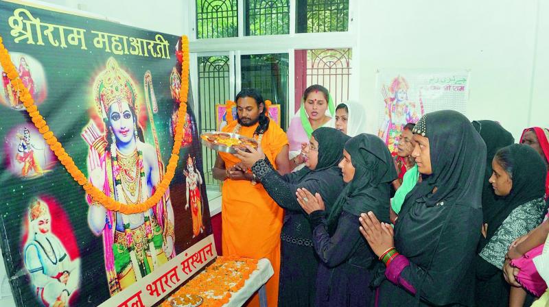 Muslim Mahila Foundation members pray to Lord Rama ahead of the Ramanavami festival in Varanasi on Saturday. (Image: PTI) Muslim Mahila Foundation members pray to Lord Rama ahead of the Ramanavami festival in Varanasi on Saturday. (Image: PTI)