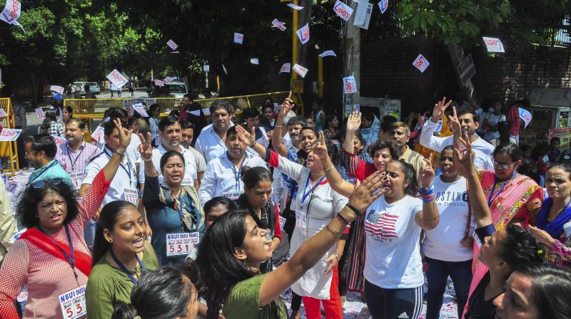 Students raise slogans as they campaign during Delhi University elections, in New Delhi, on Wednesday. (Photo: File) Students raise slogans as they campaign during Delhi University elections, in New Delhi, on Wednesday. (Photo: File)