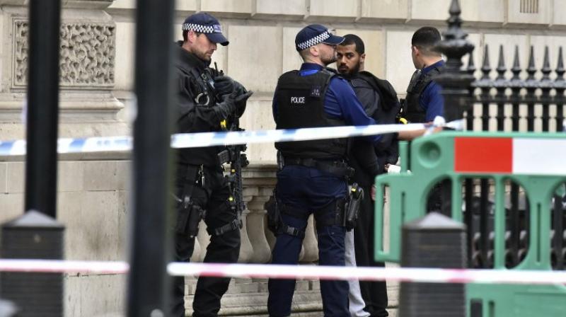Witnesses reported seeing armed police blocking off Whitehall (Photo: AP) Witnesses reported seeing armed police blocking off Whitehall (Photo: AP)