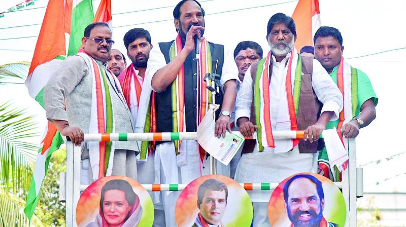 TPCC chief N. Uttam Kumar Reddy adresses a gathering while Telangana Congress in-charge R.C. Khuntia and other leaders look on as they take out a Nirudyoga Chaitanya Yatra in Hyderabad on Tuesday. (Photo: DC) TPCC chief N. Uttam Kumar Reddy adresses a gathering while Telangana Congress in-charge R.C. Khuntia and other leaders look on as they take out a Nirudyoga Chaitanya Yatra in Hyderabad on Tuesday. (Photo: DC)