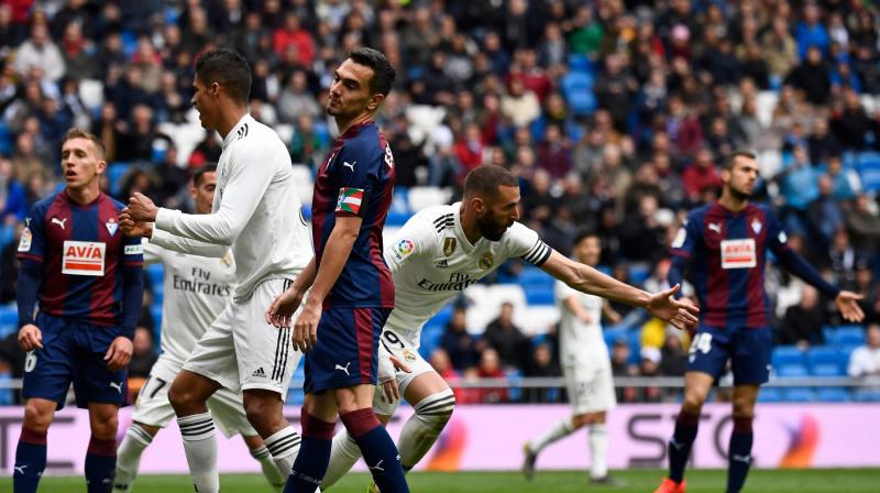 Benzema had an early strike disallowed at a barely half-full Santiago Bernabeu for offside and the visitors took a surprise lead in the 39th minute thanks to a cool finish from forward Marc Cardona, who is on loan from Barcelona. Benzema had an early strike disallowed at a barely half-full Santiago Bernabeu for offside and the visitors took a surprise lead in the 39th minute thanks to a cool finish from forward Marc Cardona, who is on loan from Barcelona.