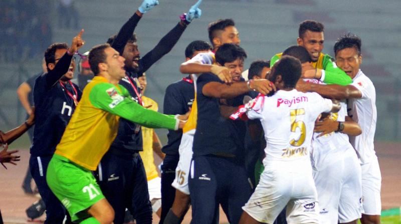 Players of Northeast United FC celebrating after scoring a goal against FC Pune City in the ISL match, at Indira Gandhi Athletics Stadium in Guwahati on Tuesday (Photo: AP) Players of Northeast United FC celebrating after scoring a goal against FC Pune City in the ISL match, at Indira Gandhi Athletics Stadium in Guwahati on Tuesday (Photo: AP)