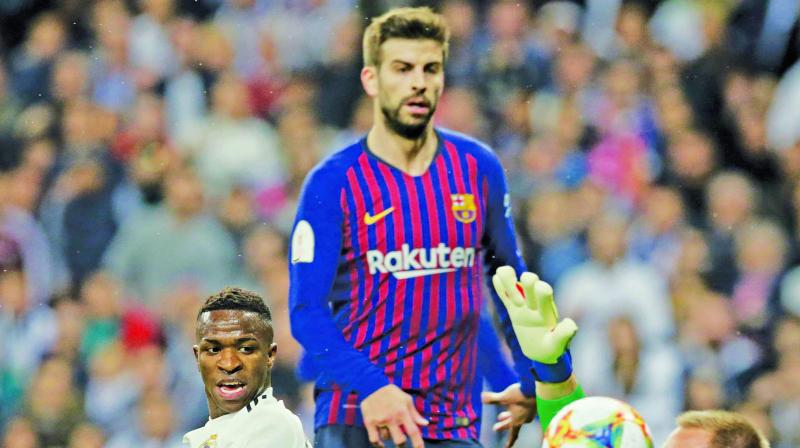 Real Madrid forward Vinicius Junior (left) vies for the ball with Barcelona goalkeeper Marc-Andre ter Stegen during the Copa del Rey semifinal match. (Photo: AP) Real Madrid forward Vinicius Junior (left) vies for the ball with Barcelona goalkeeper Marc-Andre ter Stegen during the Copa del Rey semifinal match. (Photo: AP)