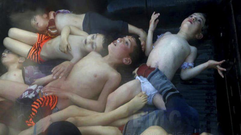 Small children foaming at the mouth and in agony after Chemical attack in Syria (Photo: AFP) Small children foaming at the mouth and in agony after Chemical attack in Syria (Photo: AFP)