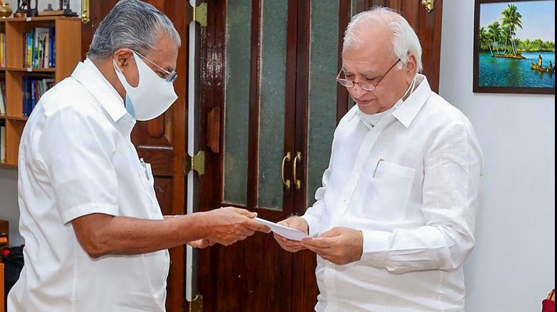 Kerala Chief Minister Pinarayi Vijayan with Governor Arif Mohammed Khan. (PTI)