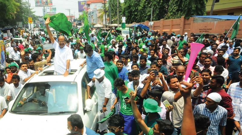 Muslim League leader P.K. Kunhalikutty waves to the crowds after emerging winner in the Malappuram bypoll on Monday. Muslim League leader P.K. Kunhalikutty waves to the crowds after emerging winner in the Malappuram bypoll on Monday.