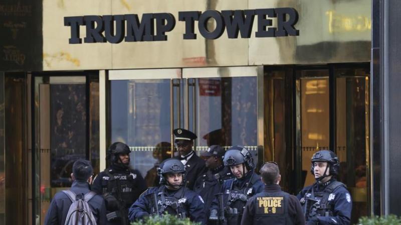 In this file photo, security personnel stand at the front entrance of Trump Tower in New York. The laptop stolen from a Secret Service agent on Friday reportedly contained details of floor plans of Trump Tower. (Photo: AP) In this file photo, security personnel stand at the front entrance of Trump Tower in New York. The laptop stolen from a Secret Service agent on Friday reportedly contained details of floor plans of Trump Tower. (Photo: AP)