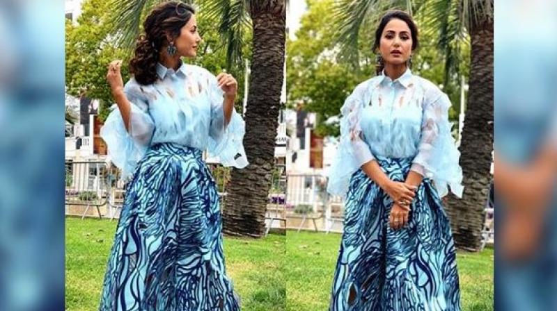 The 'Big Boss' finalist can be seen sporting a light blue shredded shirt with ripped palazzo pants and silver heels. (Photo: ANI) The 'Big Boss' finalist can be seen sporting a light blue shredded shirt with ripped palazzo pants and silver heels. (Photo: ANI)