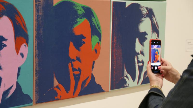 The show’s title comes from Warhol’s 1975 memoir in which he touches on key themes from his work, such as celebrity, money and love. (Photo: AP) The show’s title comes from Warhol’s 1975 memoir in which he touches on key themes from his work, such as celebrity, money and love. (Photo: AP)