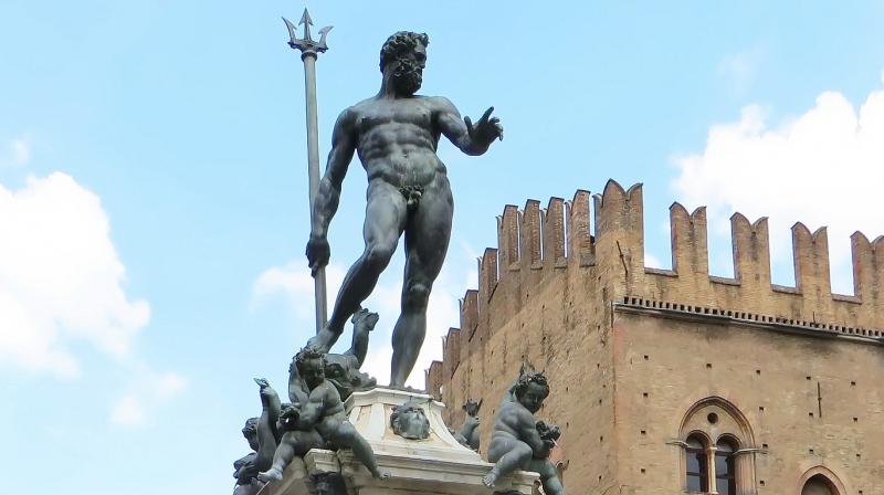 Neptune statue that statue stands in the Piazza del Nettuno in the Italian city of Bologna. Neptune statue that statue stands in the Piazza del Nettuno in the Italian city of Bologna.