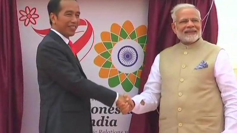 Prime Minister Modi and Indonesian President Joko Widodo. (Photo: ANI | Twitter) Prime Minister Modi and Indonesian President Joko Widodo. (Photo: ANI | Twitter)