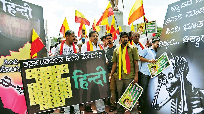 Members of Karnataka Rakshana Vedike stage a protest at the Kempegowda station in Bengaluru on Friday against the usage of Hindi in Metro signboards Members of Karnataka Rakshana Vedike stage a protest at the Kempegowda station in Bengaluru on Friday against the usage of Hindi in Metro signboards