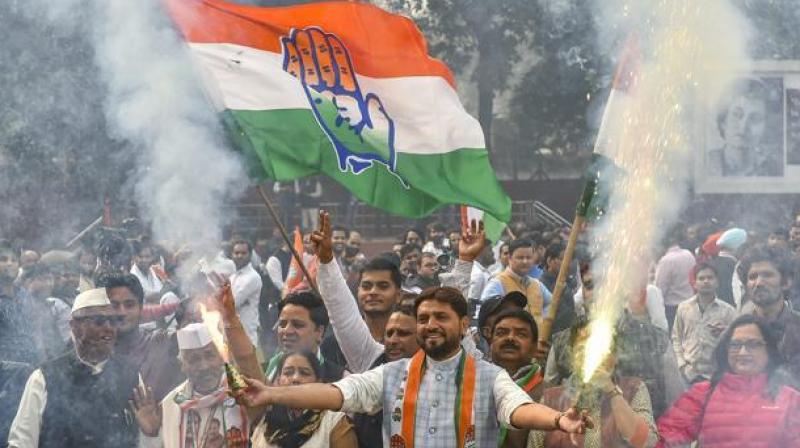 Congress workers celebrate victory in state assembly elections. (Photo: PTI) Congress workers celebrate victory in state assembly elections. (Photo: PTI)