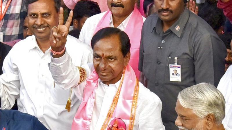 Telangana Rashtra Samithi (TRS) chief K Chandrasekhar Rao is greeted by his partyworkers as they celebrate their party's victory in the state Assembly elections, at Telangana Bhavan in Hyderabad. (Photo: PTI) Telangana Rashtra Samithi (TRS) chief K Chandrasekhar Rao is greeted by his partyworkers as they celebrate their party's victory in the state Assembly elections, at Telangana Bhavan in Hyderabad. (Photo: PTI)