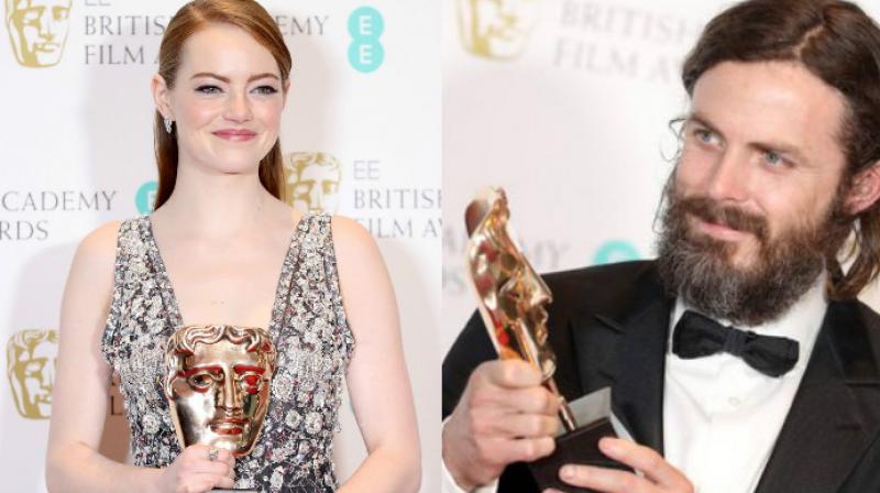 Emma Stone and Casey Affleck. Emma Stone and Casey Affleck.