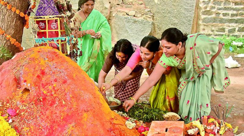 Women perform puja during Bonalu celebrations at Golkonda fort on Sunday. (Image: DC) Women perform puja during Bonalu celebrations at Golkonda fort on Sunday. (Image: DC)
