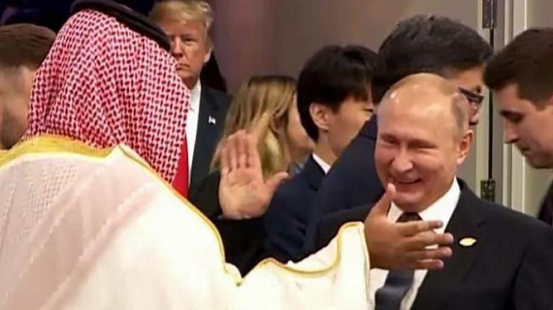 Their embrace comes amid reports that Russia and Saudi Arabia have reached a pact to cut oil production when the OPEC cartel meets on December 6 in Vienna, to help shore up collapsing crude prices. (Photo: AFP) Their embrace comes amid reports that Russia and Saudi Arabia have reached a pact to cut oil production when the OPEC cartel meets on December 6 in Vienna, to help shore up collapsing crude prices. (Photo: AFP)