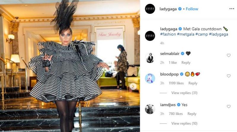 Lady Gaga, Oscar winner, wore a short Marc Jacobs 2019 Fallrunway black and white striped dress with layered ruffles. (Photo: ANI) Lady Gaga, Oscar winner, wore a short Marc Jacobs 2019 Fallrunway black and white striped dress with layered ruffles. (Photo: ANI)