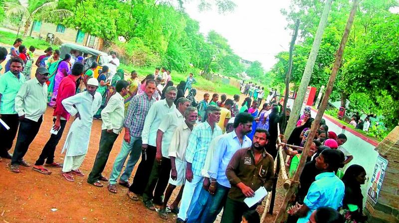 Voters stand in queue to cast their vote at a polling booth in Nandyal on Wednesday. (Photo: DC) Voters stand in queue to cast their vote at a polling booth in Nandyal on Wednesday. (Photo: DC)