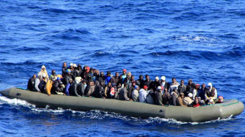A traumatised young Malian plucked out of the sea off Tunisia after clinging for two days to debris from an inflatable which sank told Thursday of how more than 80 migrants are feared drowned. (Photo: AFP/ Representational Image) A traumatised young Malian plucked out of the sea off Tunisia after clinging for two days to debris from an inflatable which sank told Thursday of how more than 80 migrants are feared drowned. (Photo: AFP/ Representational Image)