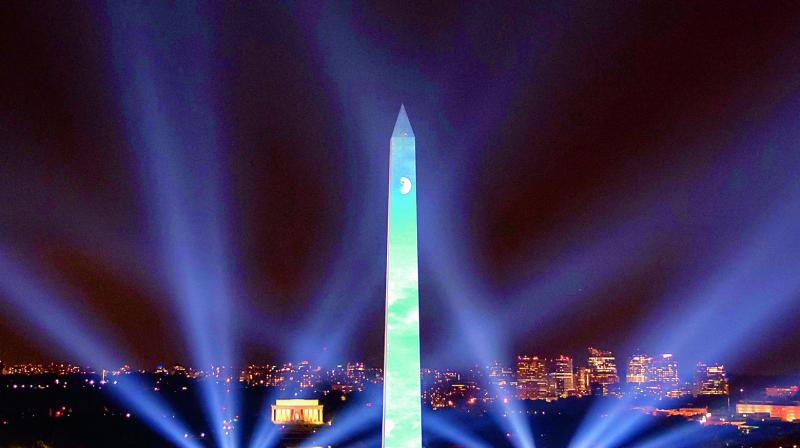 An handout photograph released by NASA shows the 50 year anniversary of the Apollo 11 mission being celebrated in the “Apollo 50: Go for the Moon” show, which combined full-motion projection-mapping artwork on the Washington Monument and archival footage to recreate the launch of Apollo 11 on Saturday in Washington, DC. — AFP An handout photograph released by NASA shows the 50 year anniversary of the Apollo 11 mission being celebrated in the “Apollo 50: Go for the Moon” show, which combined full-motion projection-mapping artwork on the Washington Monument and archival footage to recreate the launch of Apollo 11 on Saturday in Washington, DC. — AFP