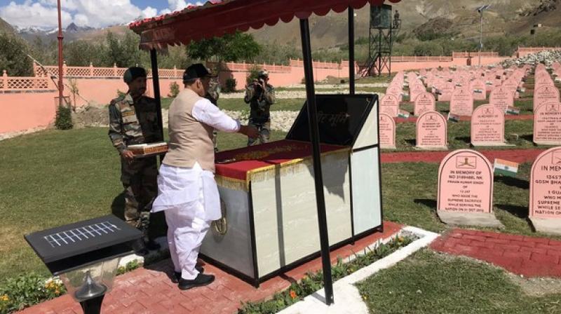 Lauding the heroes of the Kargil war, Defence Minister Rajnath Singh on Sunday said he will do his best to ensure that no harm comes to the pride and honour of the soldiers. (Photo: ANI) Lauding the heroes of the Kargil war, Defence Minister Rajnath Singh on Sunday said he will do his best to ensure that no harm comes to the pride and honour of the soldiers. (Photo: ANI)