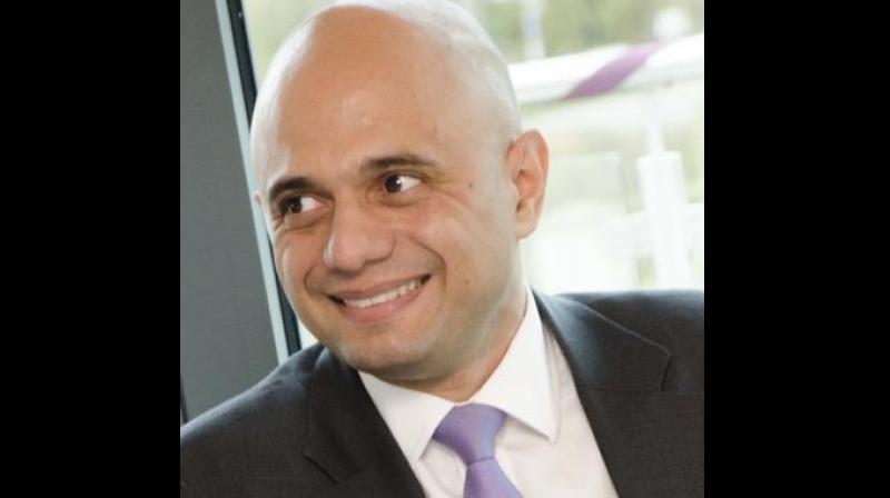 Sajid Javid became Britain's first ethnic minority finance minister on Wednesday, capping off an unlikely rise from a humble start on a street dubbed the country's worst to holding the purse strings for the world's fifth-biggest economy. (Photo: Twitter/ Sajid Javid) Sajid Javid became Britain's first ethnic minority finance minister on Wednesday, capping off an unlikely rise from a humble start on a street dubbed the country's worst to holding the purse strings for the world's fifth-biggest economy. (Photo: Twitter/ Sajid Javid)