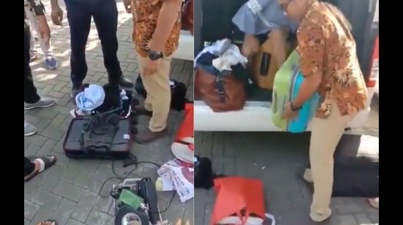 In the video, a woman can be seen arguing with the officials from the hotel who seem to be vigorously going through the suitcases. (Photo: screengrab/ Twitter) In the video, a woman can be seen arguing with the officials from the hotel who seem to be vigorously going through the suitcases. (Photo: screengrab/ Twitter)