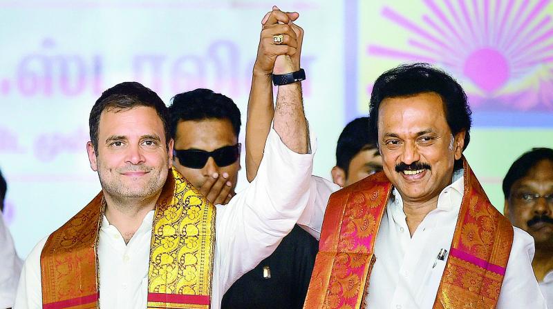 Congress chief Rahul Gandhi with Dravida Munnetra Kazhagam (DMK) chief M.K. Stalin during an election campaign in Salem on Friday. (Photo: PTI) Congress chief Rahul Gandhi with Dravida Munnetra Kazhagam (DMK) chief M.K. Stalin during an election campaign in Salem on Friday. (Photo: PTI)