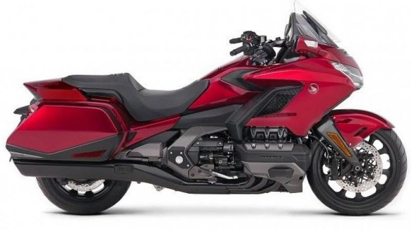 The 2018 edition of the Honda Gold Wing motorcycle will now be available here at a cost of Rs 26.85 lakh. Honda Motorcycle and Scooter India announced the delivery of the candy ardent red colour tourer on Tuesday, a press release said. The 2018 edition of the Honda Gold Wing motorcycle will now be available here at a cost of Rs 26.85 lakh. Honda Motorcycle and Scooter India announced the delivery of the candy ardent red colour tourer on Tuesday, a press release said.