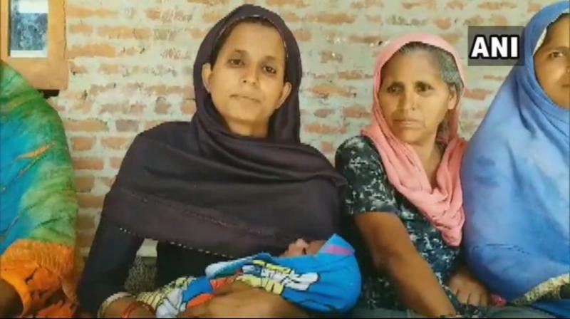 The infant's mother Menaj Begum also hailed the governance of the Narendra Modi government and expressed hope of being benefited by the next government's schemes. (Photo: ANI) The infant's mother Menaj Begum also hailed the governance of the Narendra Modi government and expressed hope of being benefited by the next government's schemes. (Photo: ANI)