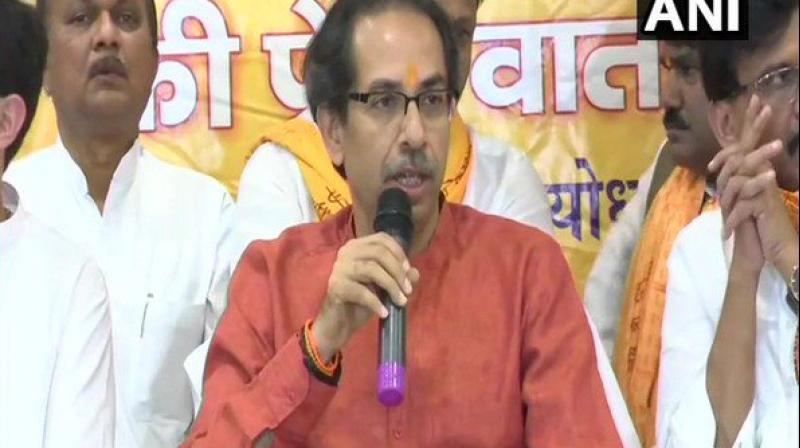 Thackeray, who reached here this morning along with his son Aditya, will first meet party MPs, who are here since Saturday evening, and then pay obeisance at the makeshift temple. (Photo: ANI) Thackeray, who reached here this morning along with his son Aditya, will first meet party MPs, who are here since Saturday evening, and then pay obeisance at the makeshift temple. (Photo: ANI)