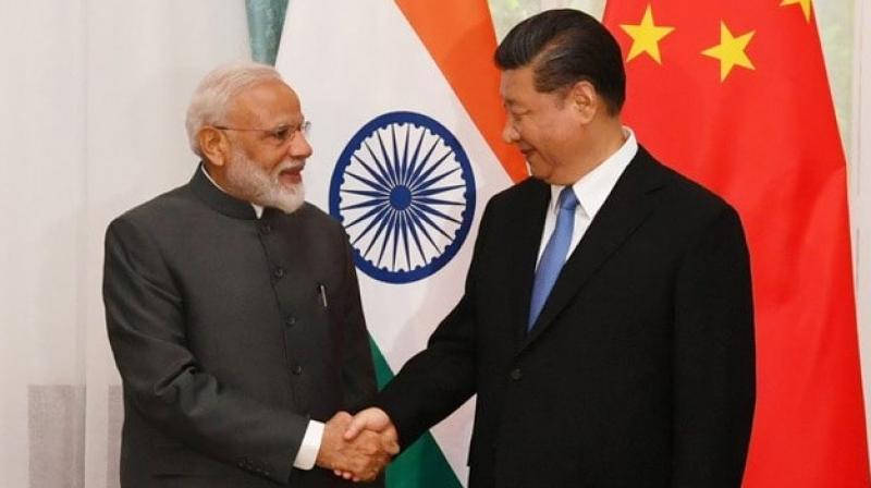 PM Modi, Xi and Russian President Vladimir Putin met at the recently held Shanghai Cooperation Organisation (SCO) summit at Kirgiz capital Bishkek. (Photo: Twitter/ @PIB_India) PM Modi, Xi and Russian President Vladimir Putin met at the recently held Shanghai Cooperation Organisation (SCO) summit at Kirgiz capital Bishkek. (Photo: Twitter/ @PIB_India)