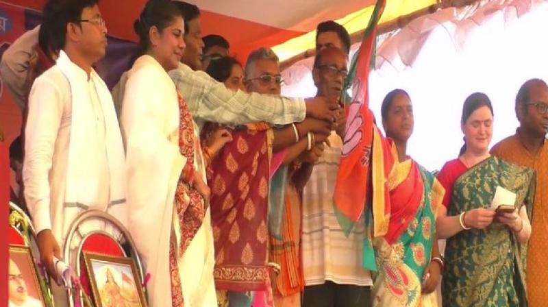 Many Trinamool Congress (TMC) workers and leaders joined the BJP here in presence of West Bengal BJP President Dilip Ghosh. (Photo: ANI) Many Trinamool Congress (TMC) workers and leaders joined the BJP here in presence of West Bengal BJP President Dilip Ghosh. (Photo: ANI)