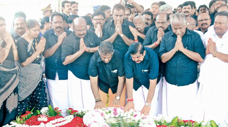 Chief Minister Edappadi K. Palaniswami and his deputy O. Panneerselvam along with senior ministers and AIADMK cadres paid floral tribute to late Chief Minister J Jayalalithaa’s second death anniversary at her memorial in Marina. (Photo: DC) Chief Minister Edappadi K. Palaniswami and his deputy O. Panneerselvam along with senior ministers and AIADMK cadres paid floral tribute to late Chief Minister J Jayalalithaa’s second death anniversary at her memorial in Marina. (Photo: DC)