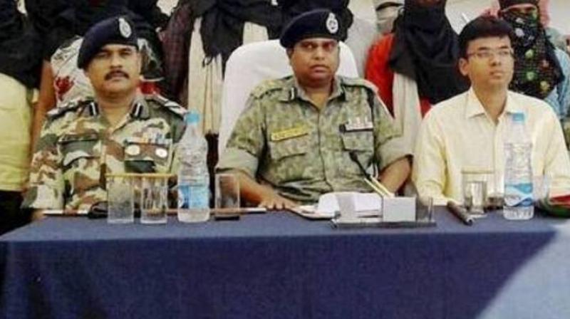 SRP Kalluri, the Inspector General of Bastar district of Chhattisgarh (centre). (Photo: PTI) SRP Kalluri, the Inspector General of Bastar district of Chhattisgarh (centre). (Photo: PTI)