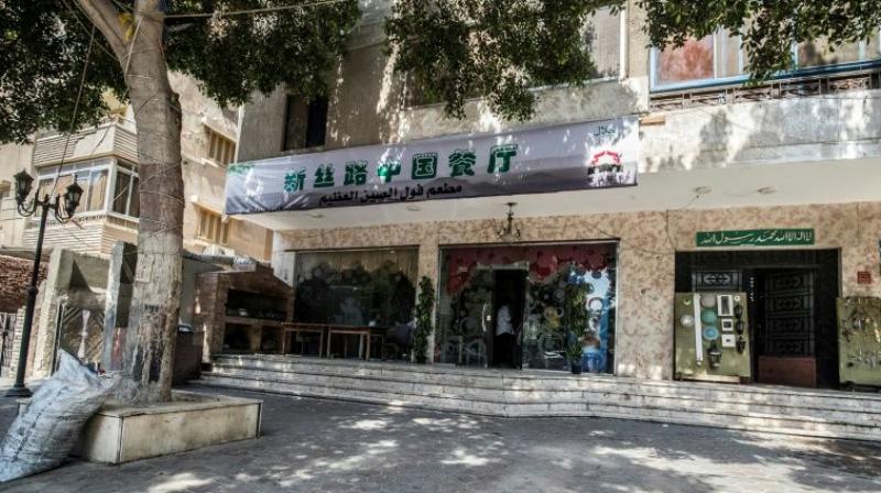 He was picked up in broad daylight with friends, and taken to a Cairo police station where Chinese officials grilled him about what he was doing in Egypt. (Photo: AFP) He was picked up in broad daylight with friends, and taken to a Cairo police station where Chinese officials grilled him about what he was doing in Egypt. (Photo: AFP)