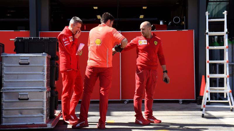 Ferrari crew members unpack equipment at the Albert Park circuit in Melbourne on Tuesday, ahead of the Formula One Australian Grand Prix. AFP Photo Ferrari crew members unpack equipment at the Albert Park circuit in Melbourne on Tuesday, ahead of the Formula One Australian Grand Prix. AFP Photo