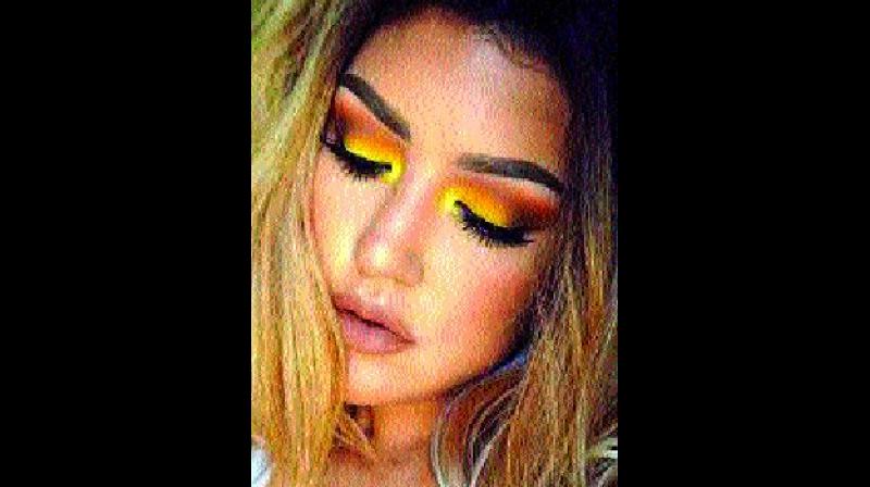 Abstract looks, theme-centric looks, classy yellow smokey eyes with nude lips and stage make-up work best for the colour yellow. (Representational image) Abstract looks, theme-centric looks, classy yellow smokey eyes with nude lips and stage make-up work best for the colour yellow. (Representational image)