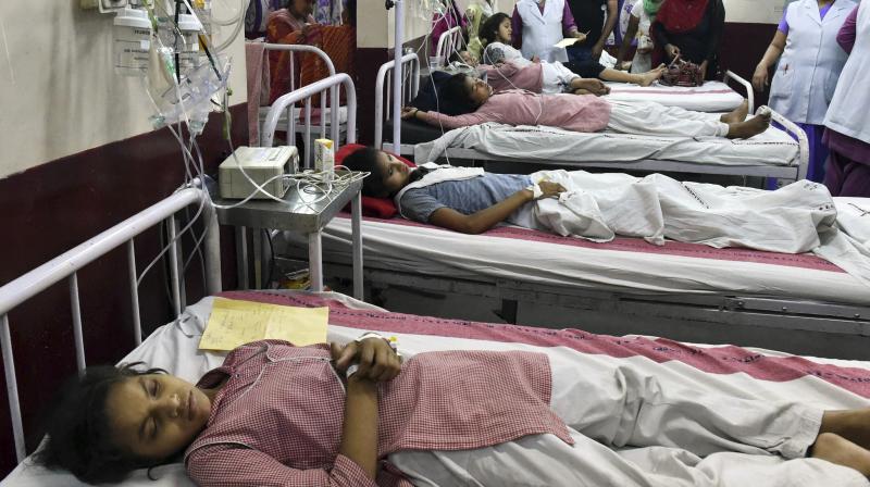Students of the Rani Jhansi Sarvodaya Kanya Vidyalaya school receive treatment at a government hospital in New Delhi. (Photo: PTI) Students of the Rani Jhansi Sarvodaya Kanya Vidyalaya school receive treatment at a government hospital in New Delhi. (Photo: PTI)