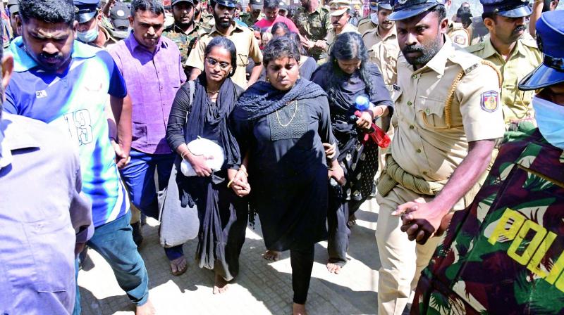 Members of the Manithi group return from Pamba after protests erupted against their visit to Ayyappa temple at Sabarimala on Sunday. (Photo: Rajeev Prasad) Members of the Manithi group return from Pamba after protests erupted against their visit to Ayyappa temple at Sabarimala on Sunday. (Photo: Rajeev Prasad)