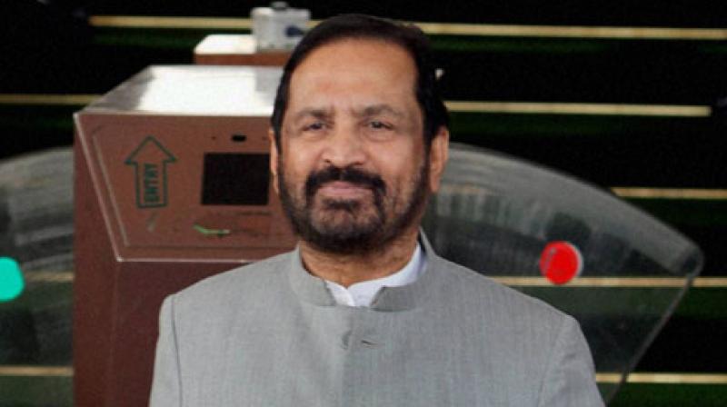 As the storm gained in intensity on Wednesday, Kalmadi chose to step aside from the post. (Photo: File) As the storm gained in intensity on Wednesday, Kalmadi chose to step aside from the post. (Photo: File)