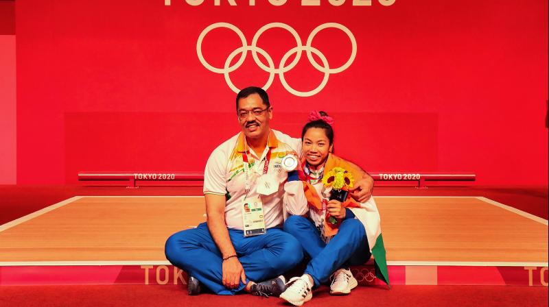 Olympic Silver Medallist Mirabai Chanu along with her coach Vijay Sharma. (Photo: Twitter/ Mirabai Chanu)