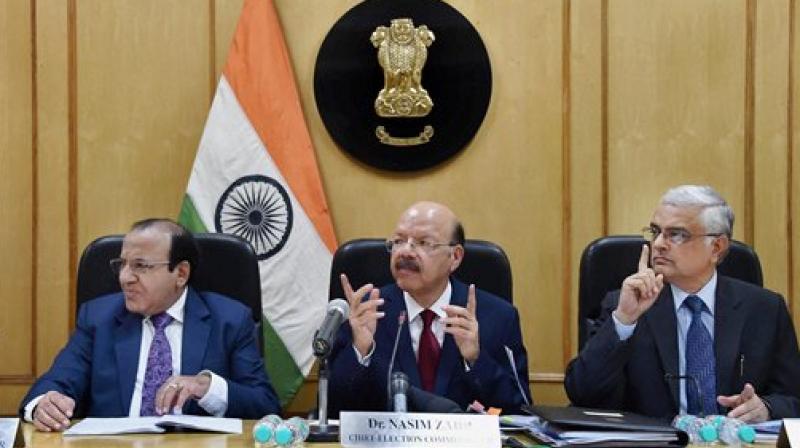 Chief Election Commissioner Nasim Zaidi, along with Election Commissioners Achal Kumar Jyoti and Om Prakash Rawat. (Photo: PTI) Chief Election Commissioner Nasim Zaidi, along with Election Commissioners Achal Kumar Jyoti and Om Prakash Rawat. (Photo: PTI)