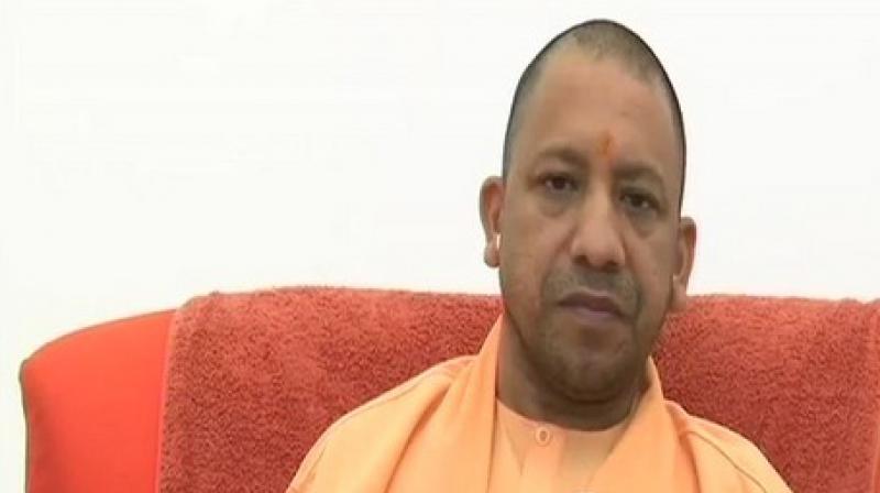 Addressing a public rally here, the 46-year-old Chief Minister announced from the dais about the Bharatiya Janata Party (BJP) commitment to the cause of Ram Temple in Ayodhya. (Photo: ANI) Addressing a public rally here, the 46-year-old Chief Minister announced from the dais about the Bharatiya Janata Party (BJP) commitment to the cause of Ram Temple in Ayodhya. (Photo: ANI)