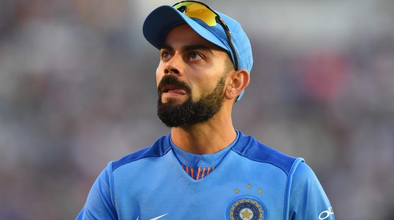 The Indian skipper also lamented boundary conceded by paceman Umesh Yadav after bolwing a tight 19th over. (Photo: AFP) The Indian skipper also lamented boundary conceded by paceman Umesh Yadav after bolwing a tight 19th over. (Photo: AFP)
